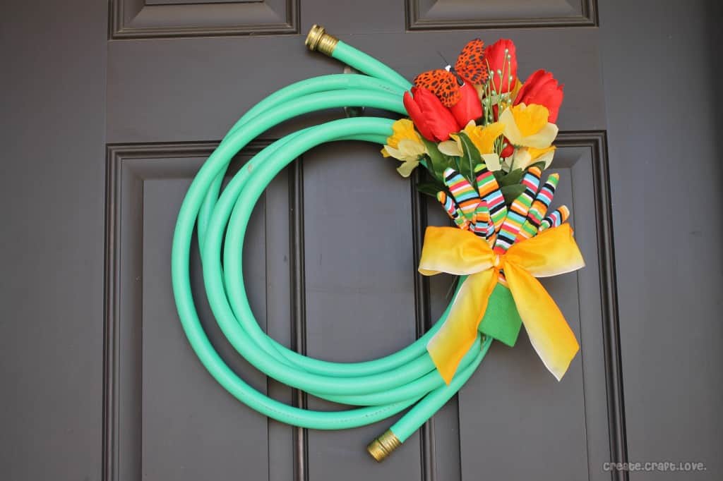 Garden Hose Spring Wreath via createcraftlove.com #spring #wreath #garden