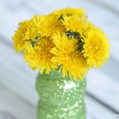 Upcycle an old yogurt cup to create these upcycled Bud Vases! via createcraftlove.com for The 36th Avenue #upcycle #budvases #mothersday #kidscrafts