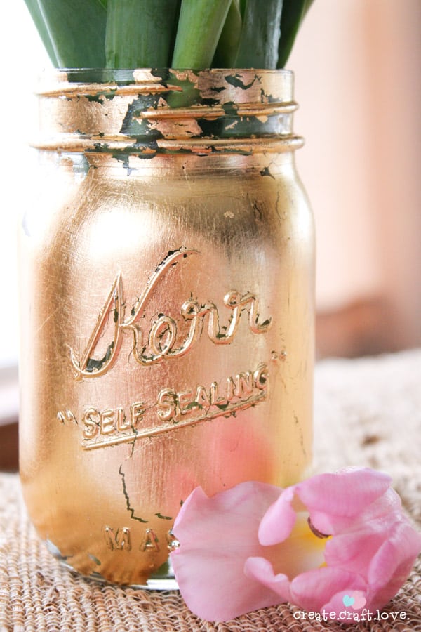 This Gold Leaf Mason Jar Vase is keeping with the trends this spring! #spring #gold #goldleaf #masonjars