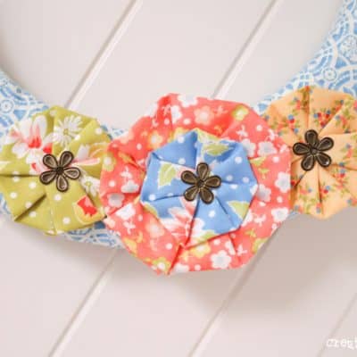 Vintage Scrap Wreath made from left over scrap fabric! via createcraftlove.com #wreath #fabric #summer