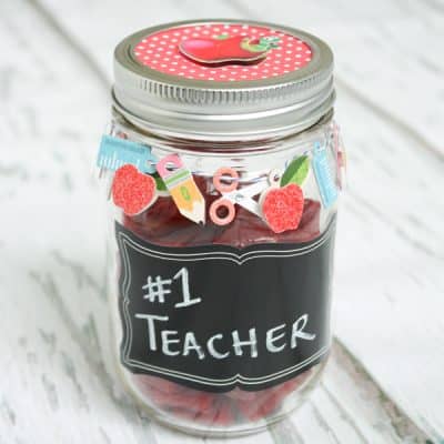 Grab some scrapbook embellishments, a mason jar and some candy to create this Mason Jar Gift for Teacher's Appreciation Week! www.createcraftlove.com