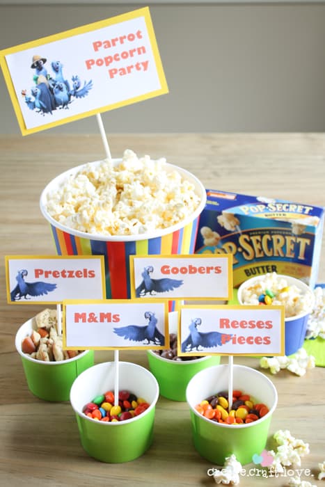 Throw together this Parrot Popcorn Party to celebrate the release of Rio 2! via createcraftlove.com
