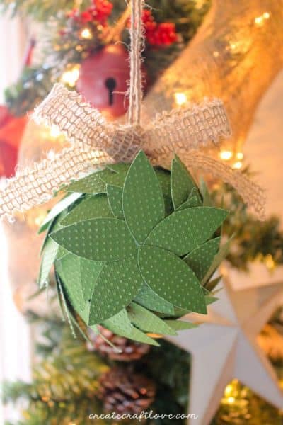 Add a little more to your Christmas decor with this Holiday Kissing Ball tutorial! via createcraftlove.com
