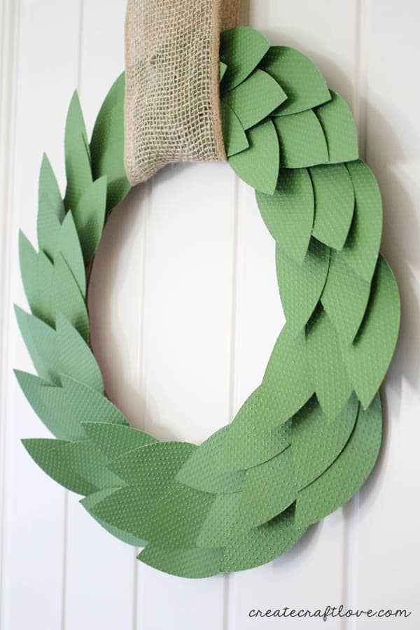 Whip up this Paper Bayleaf Wreath in under 20 minutes! Perfect addition to your Christmas or Holiday Decor! via createcraftlove.com