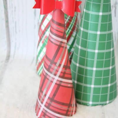 These Plaid Wrapped Christmas Trees are a quick way to spruce up your Christmas decor! via createcraftlove.com for The 36th Avenue