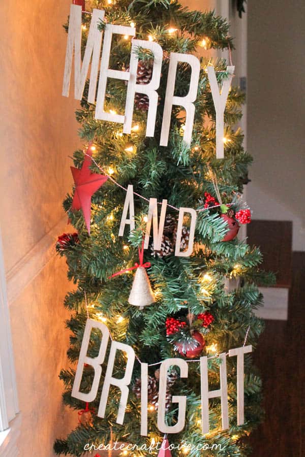 Create your own DIY Wooden Banner using the Cricut Explore! Find out how at createcraftlove.com!