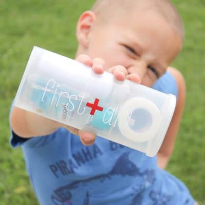 Small, portable DIY First Aid Kit that easily fits in purses and beach bags for any injuries the summer throws at you! via createcraftlove.com