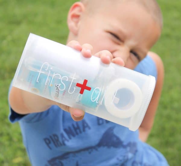 Small, portable DIY First Aid Kit that easily fits in purses and beach bags for any injuries the summer throws at you! via createcraftlove.com