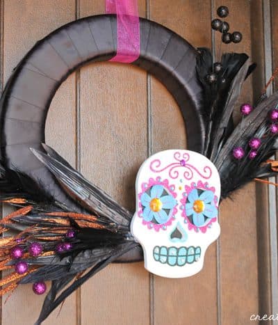Create this colorful and bright Day of the Dead Wreath in under 15 minutes! via createcraftlove.com
