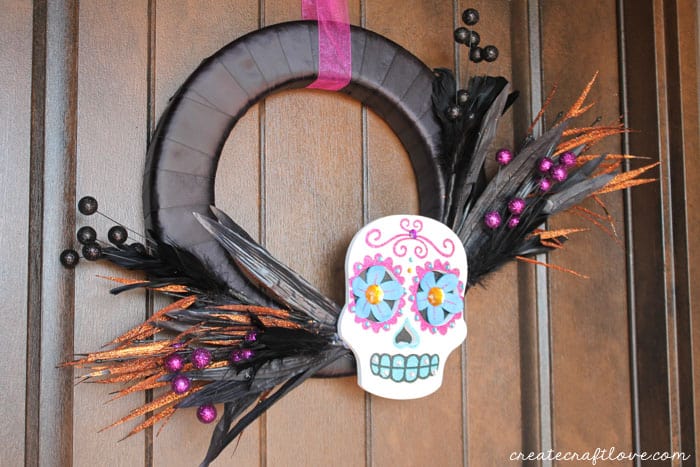 Create this colorful and bright Day of the Dead Wreath in under 15 minutes! via createcraftlove.com