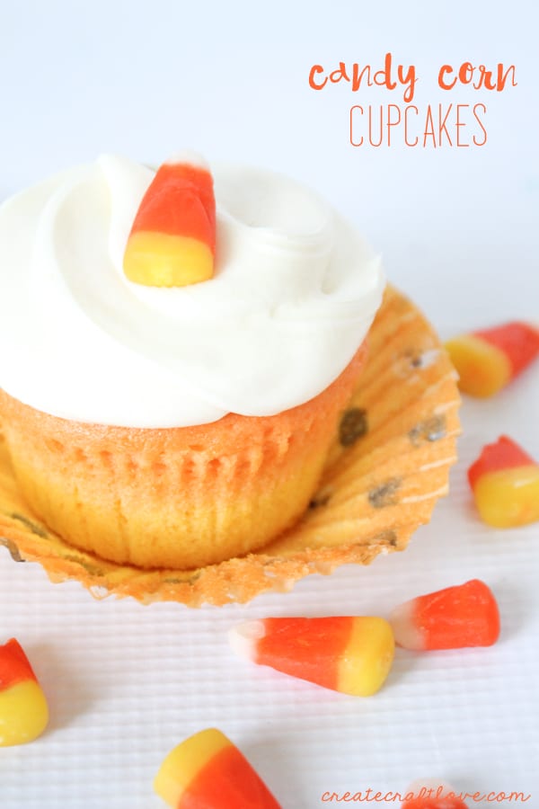 You don't have to be a fan of candy corn to love these vanilla Candy Corn Cupcakes! via createcraftlove.com