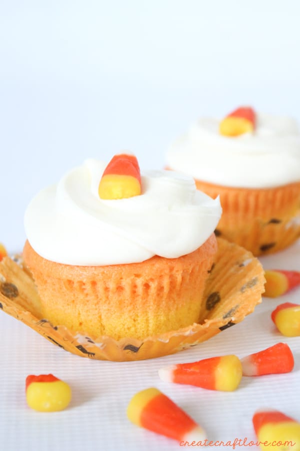 You don't have to be a fan of candy corn to love these vanilla Candy Corn Cupcakes!