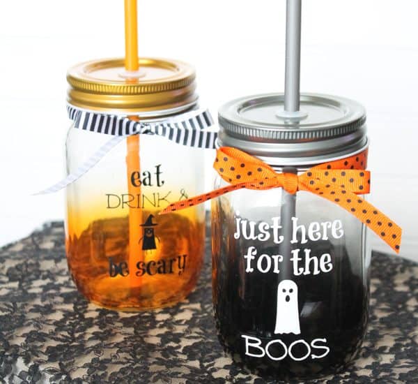 Whether you partake in an alcoholic beverage or not, these are the cutest Halloween Mason Jar Drink Glasses! via createcraftlove.com
