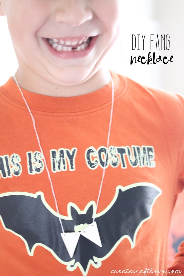 This DIY Fang Necklace is a fun kid's craft for Halloween! via createcraftlove.com