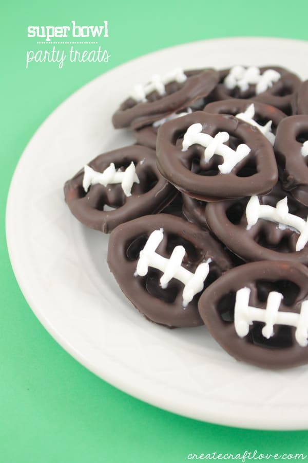 These bite sized chocolate covered football pretzels make perfect Super Bowl Party Treats! via createcraftlove.com