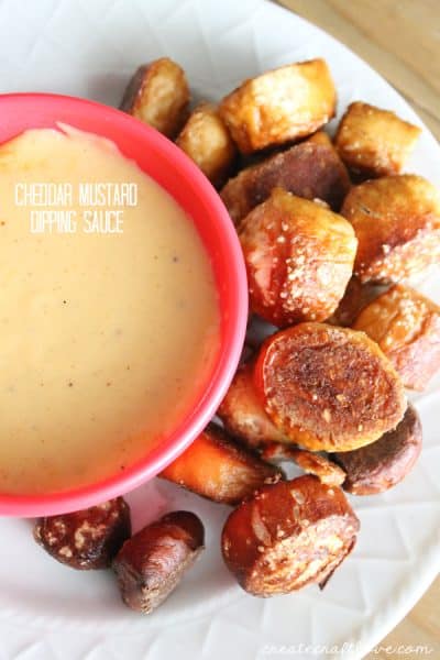 Cheddar Mustard Dipping Sauce traditionally pairs with pretzels but it compliments many dishes well. You can spruce up chicken wings, raw vegetables (cauliflower in particular), apples, or put it on your favorite sandwich. via createcraftlove.com