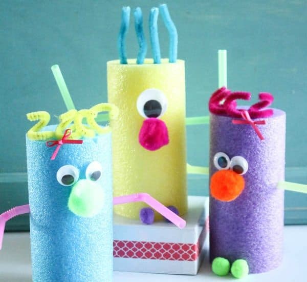 These Pool Noodle Monsters are a great kids craft for a summer day! via createcraftlove.com
