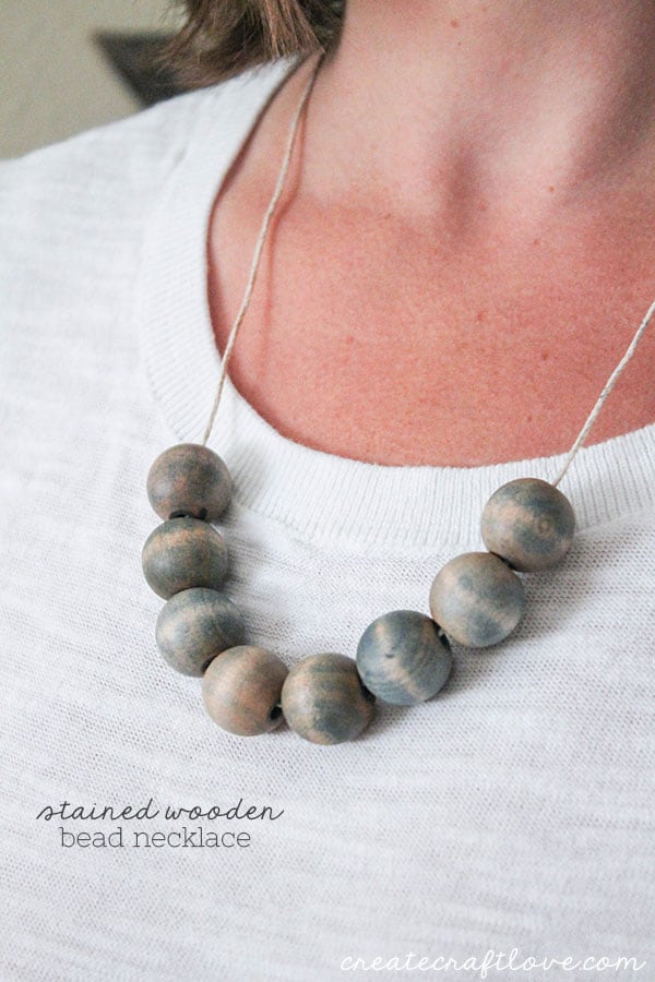 This Stained Wooden Bead Necklace is a trendy way to dress up your fall wardrobe!