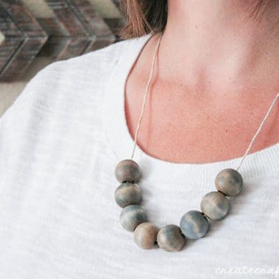 This Stained Wooden Bead Necklace is a trendy way to dress up your fall wardrobe!
