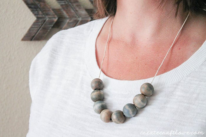 This Stained Wooden Bead Necklace is a trendy way to dress up your fall wardrobe!