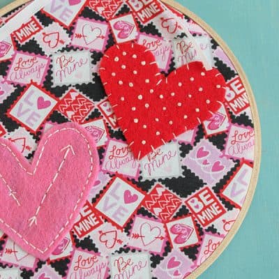 What do you get when you combine Valentine fabric, felt and embroidery floss? This adorable Valentine Hoop Art! via createcraftlove.com