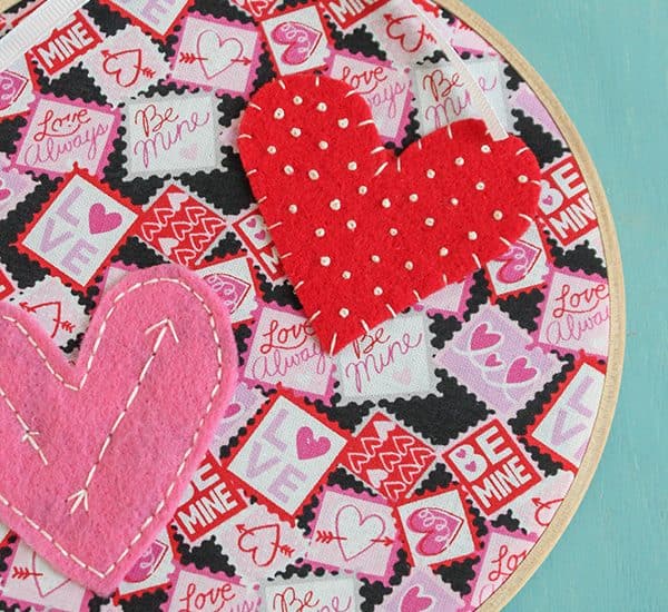 What do you get when you combine Valentine fabric, felt and embroidery floss? This adorable Valentine Hoop Art! via createcraftlove.com