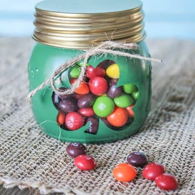 These Shamrock Gift Jars are a sweet treat with a hint of the rainbow! via createcraftlove.com