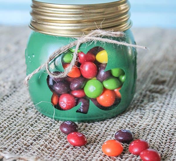 These Shamrock Gift Jars are a sweet treat with a hint of the rainbow! via createcraftlove.com