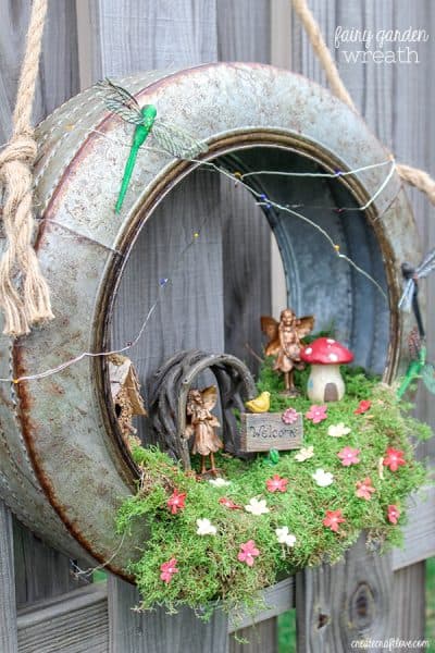 Create a whimsical fairy habitat to welcome spring!  This Fairy Garden Wreath will impress any guest! #ad #hobbylobbystyle #hobbylobbymade