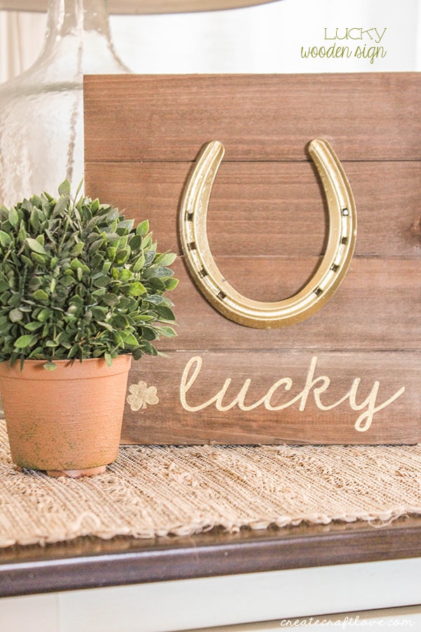 This Lucky Wooden Sign has a pop of gold with a farmhouse feel!