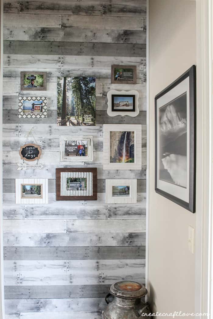 Use adhesive wall paper to create a statement Faux Pallet Wood Wall!