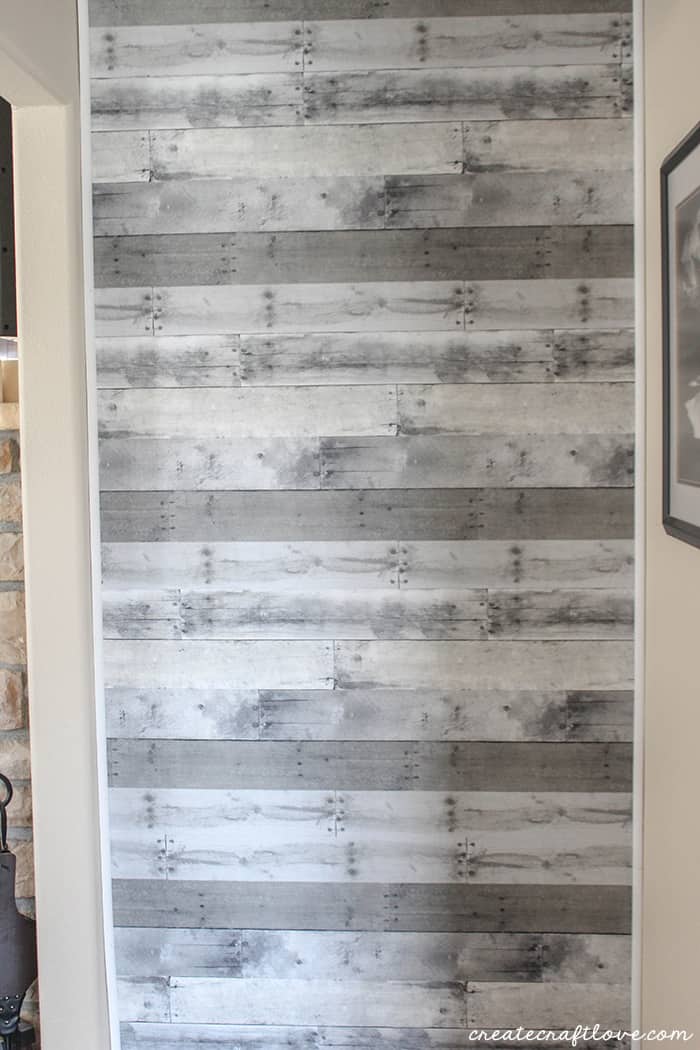 Quarter round adds the finishing touches to the wood pallet wall!