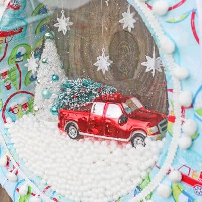 Your guests will go nuts for this snow globe wreath!