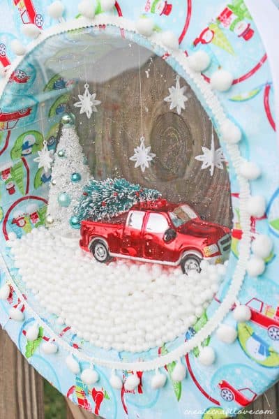 Your guests will go nuts for this snow globe wreath!