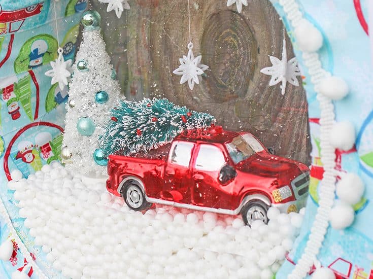 Your guests will go nuts for this snow globe wreath!