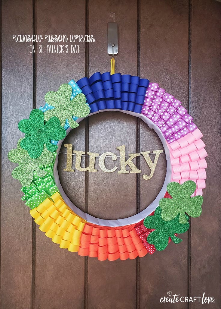 You're sure to find a pot of gold at the end of this bright and cheery Rainbow Ribbon Wreath!  #createcraftlove #stpatricksday #rainbow #wreaths