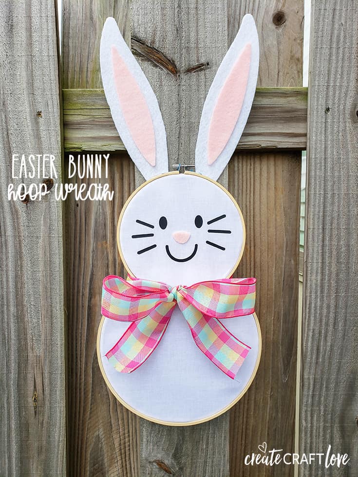 Greet your guests this spring with this adorable Easter Bunny Hoop Wreath! #createcraftlove #easter #hoopwreath #wreath #easterbunny