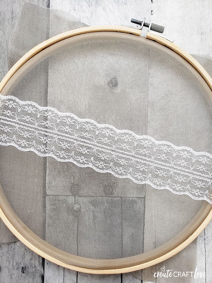 secure mesh with embroidery hoop earring holder